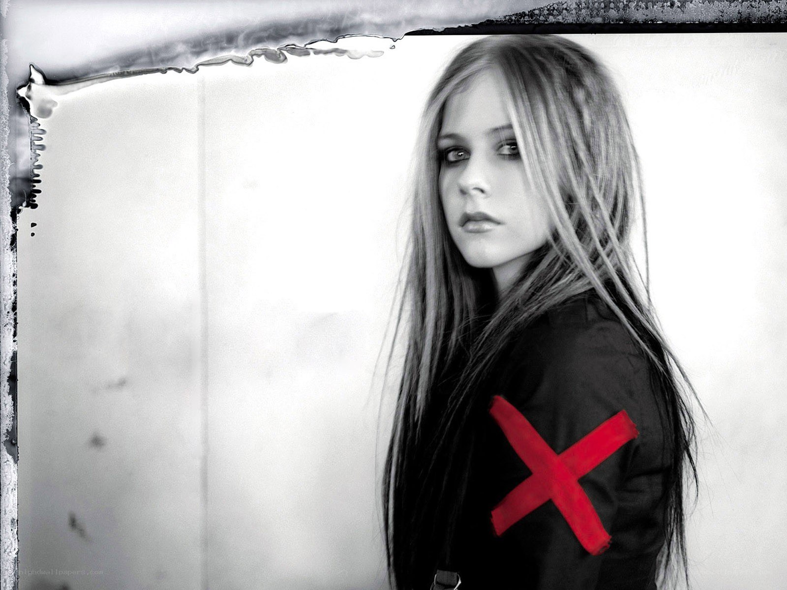Avril Lavigne with red X