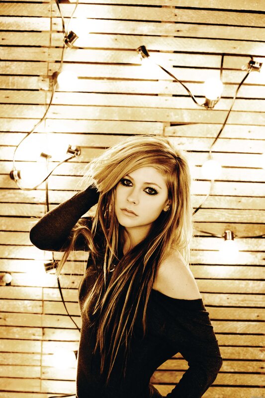 Avril Lavigne with string lights