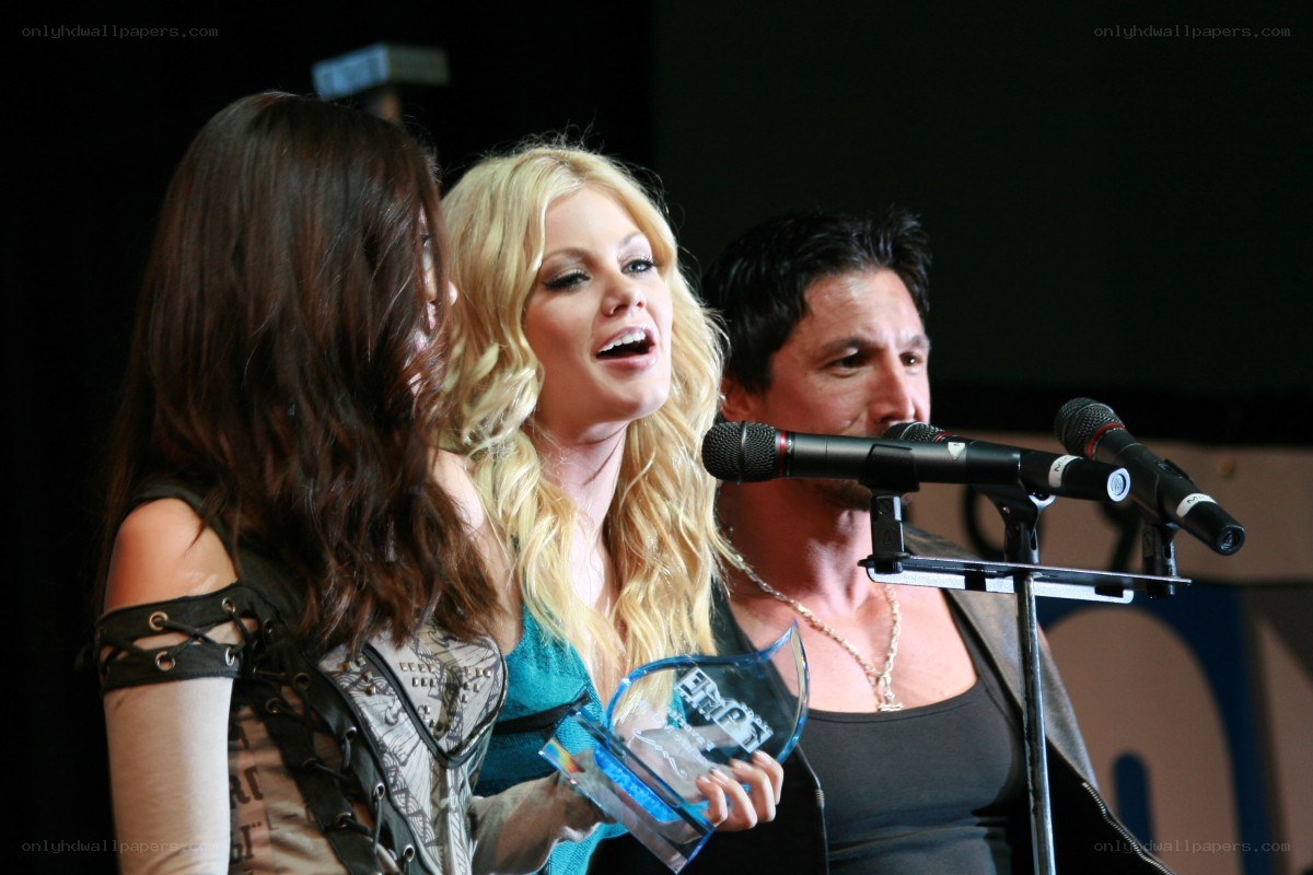 Award ceremony with three people
