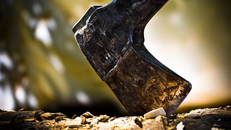 Axe Embedded in Wood