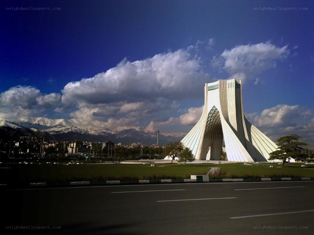 Azadi Tower with mountains