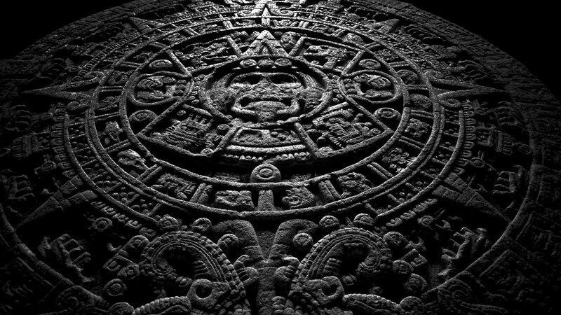 Aztec Sun Stone — Black, Dramatic, Photograph, Stone Carving, Carved Face, Circular Design