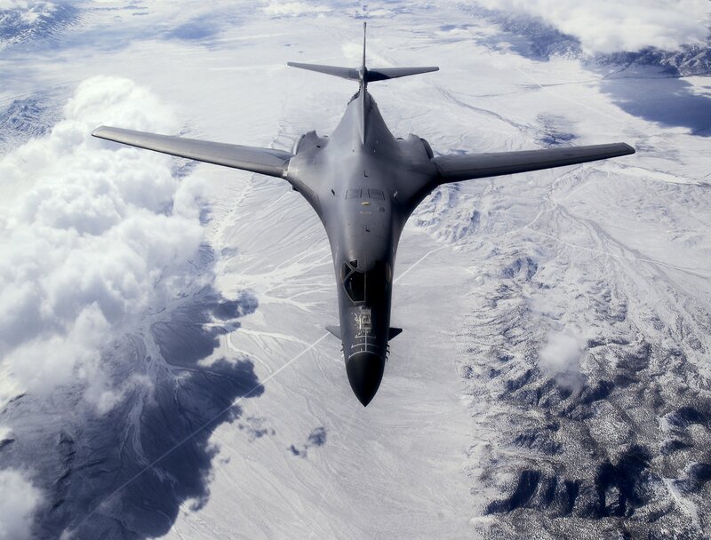 B-1 Lancer Bomber — Gray, Dramatic, Photograph, Aircraft, Clouds, Mountains
