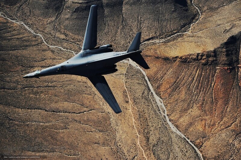 B-1 Lancer flying over canyon