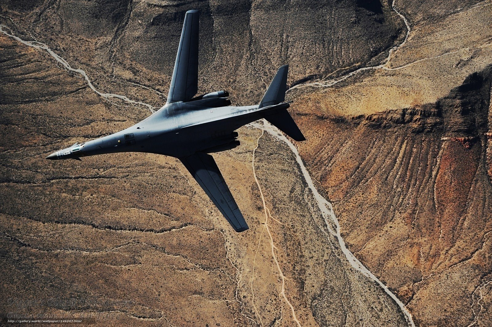 B-1 Lancer flying over canyon