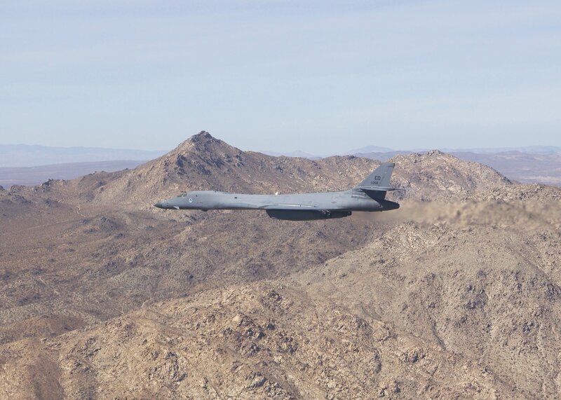 B-1 Lancer flying over mountains