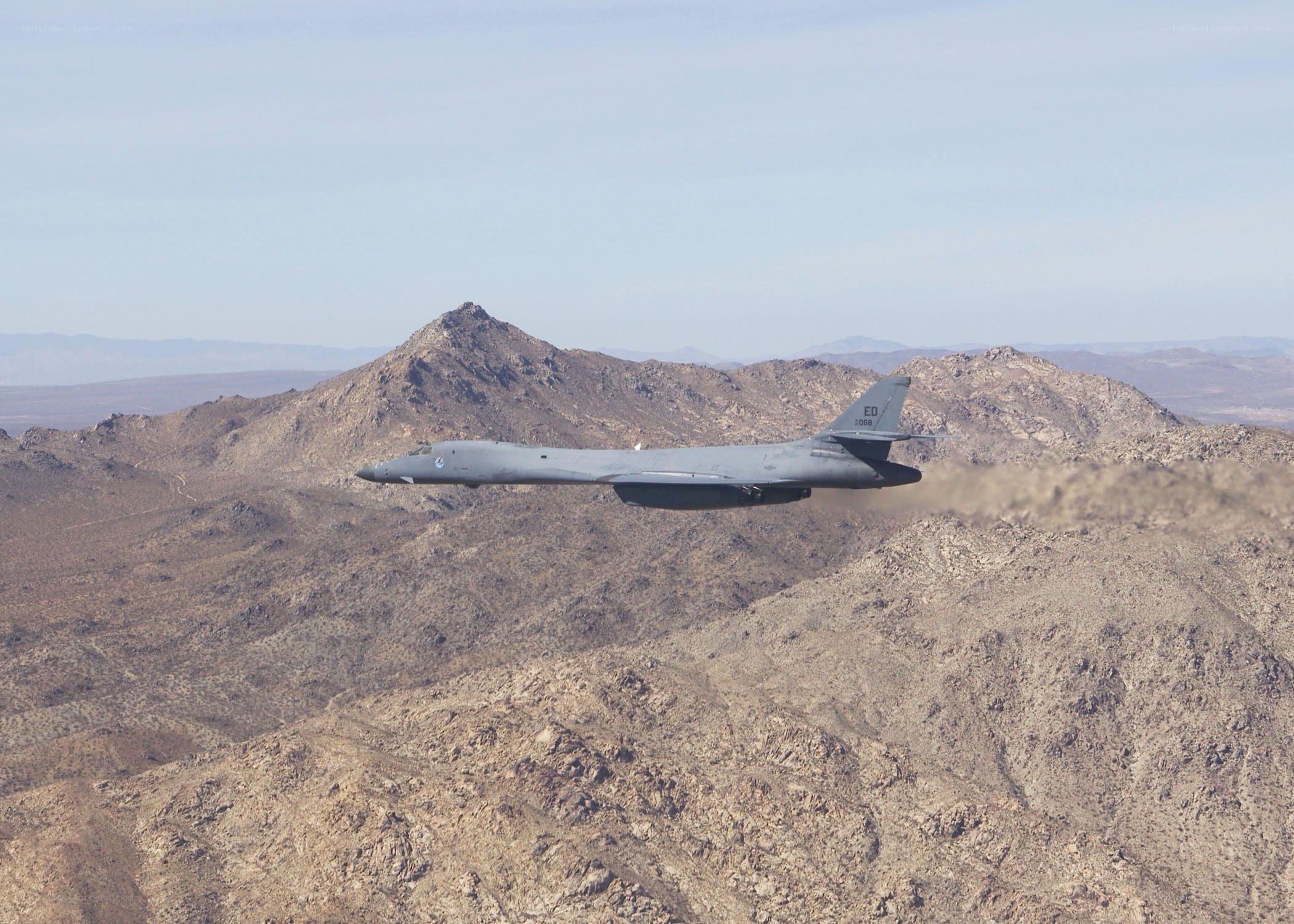 B-1 Lancer flying over mountains