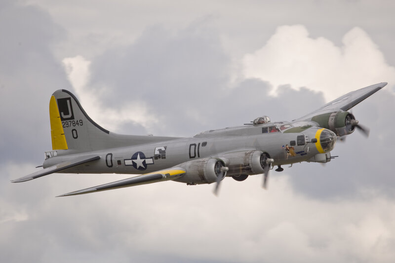 B-17 Bomber Aircraft — Gray, Dramatic, Photograph, Clouds, Propellers