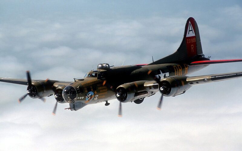 B-17 Bomber Aircraft — Green, Calm, Afternoon, Photograph, Propellers, Clouds