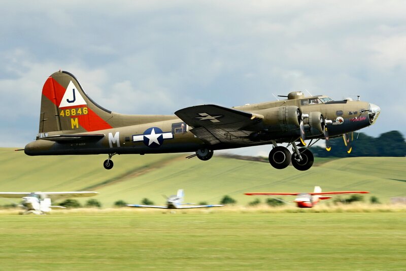 B-17 Bomber Aircraft — Green, Dynamic, Afternoon, Photograph, Airplane