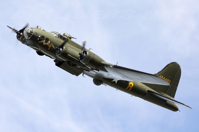 B-17 Bomber Aircraft — Green, Dynamic, Afternoon, Photograph
