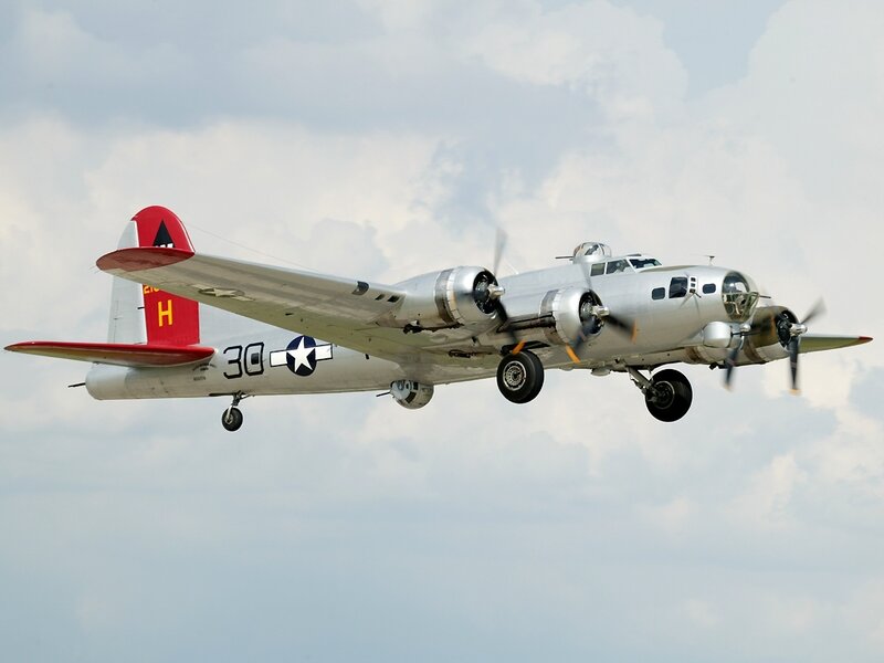 B-17 Bomber Aircraft — Silver, Calm, Afternoon