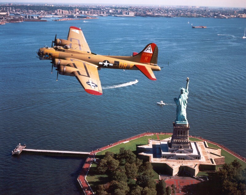 B-17 Bomber over Statue