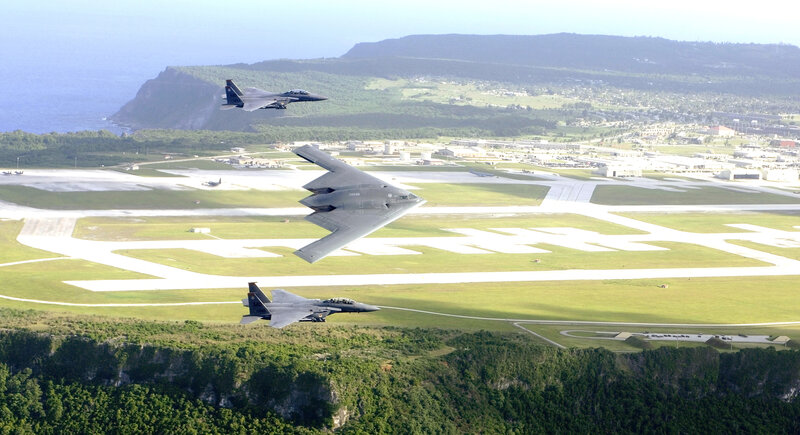 B-2 Spirit and F-15 Eagles in flight