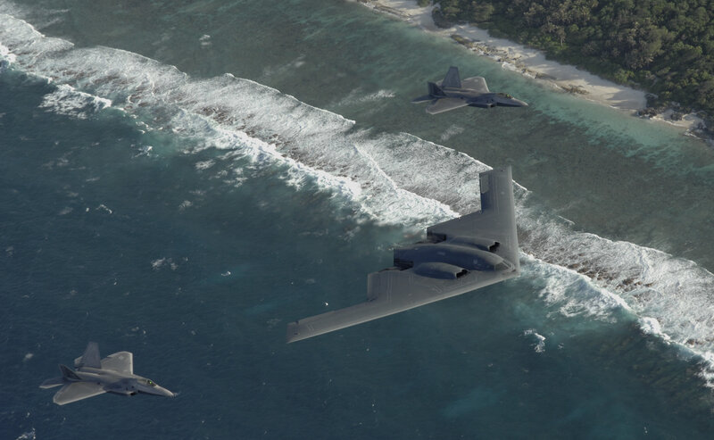 B-2 Spirit and F-22 Raptors over island
