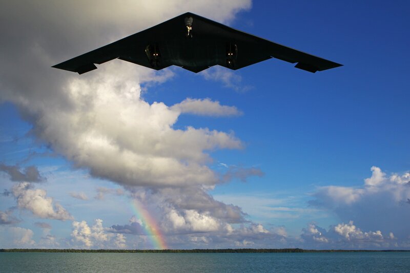 B-2 Spirit bomber flying over water