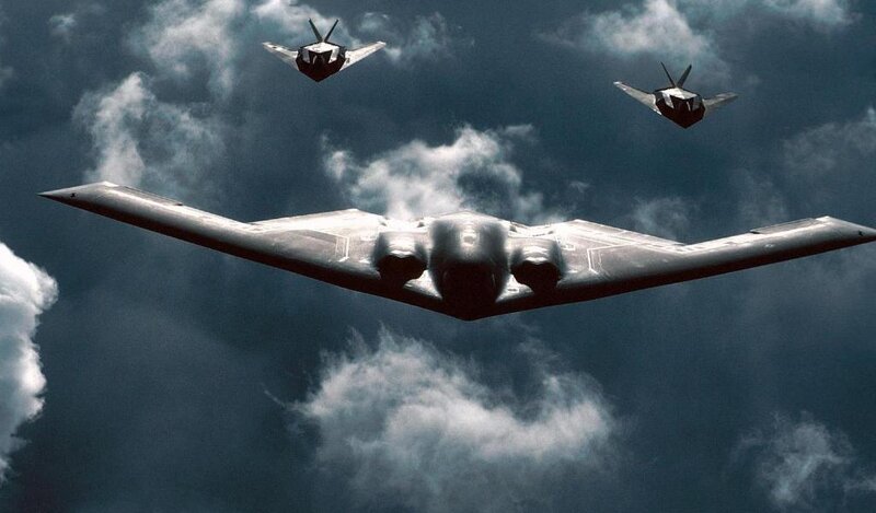 B-2 Spirit bomber with escorts
