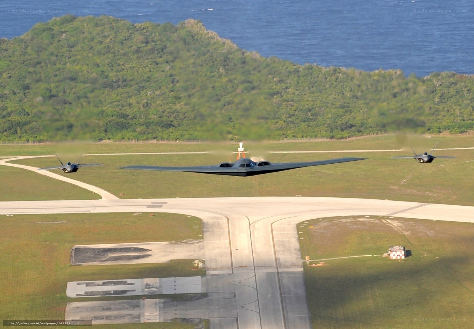 B-2 Spirit bomber with escorts