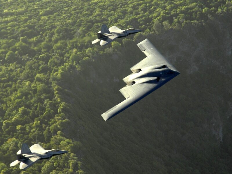 B-2 Spirit with F-22 escorts