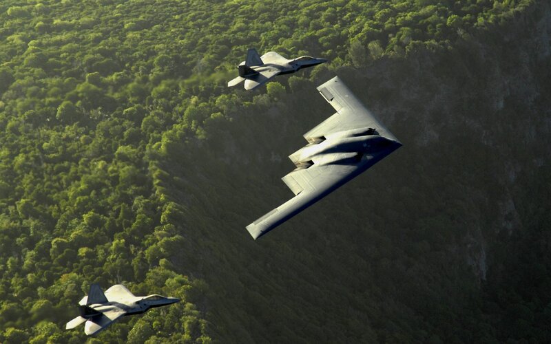 B-2 Spirit with F-22 escorts