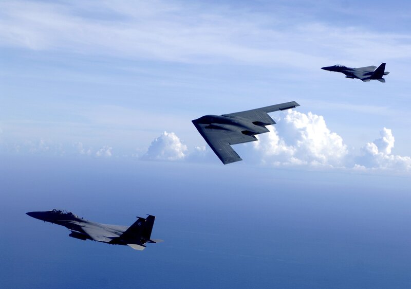 B-2 Spirit with fighter escorts