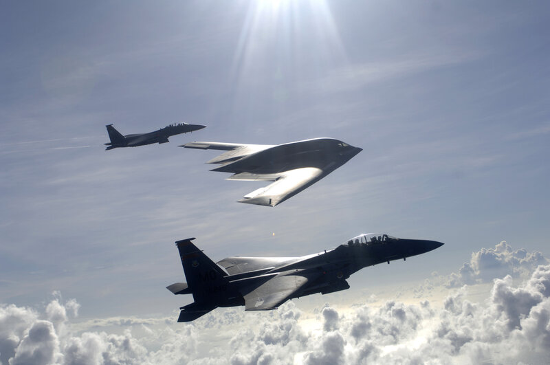 B-2 Spirit with fighter escorts