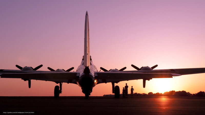 B-29 bomber at sunset