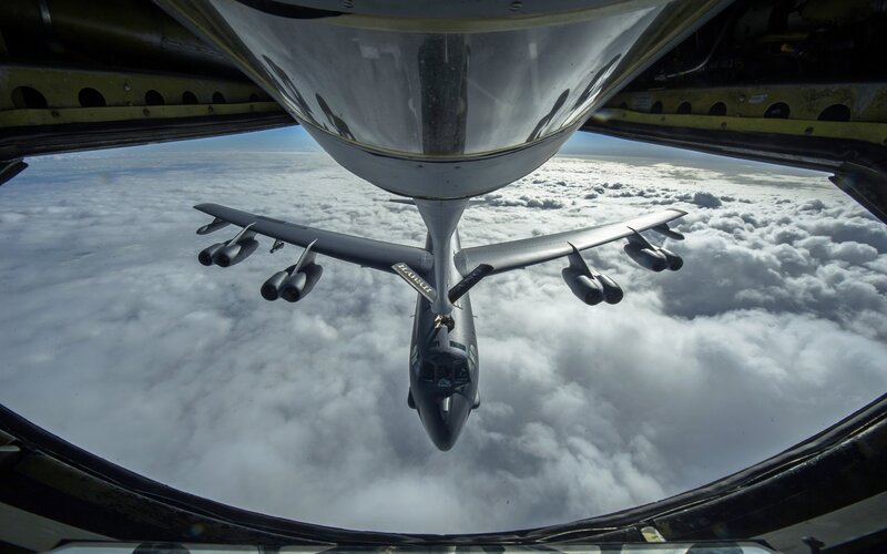 B-52 Bomber Aircraft — Gray, Dramatic, Afternoon, Photograph, Clouds