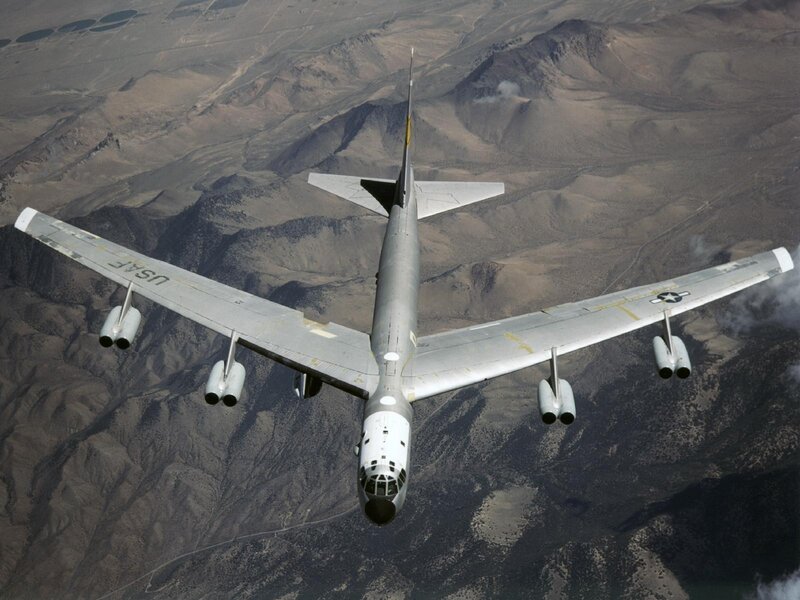 B-52 Bomber Aircraft — Gray, Dramatic, Afternoon, Photograph, Mountains, Sky