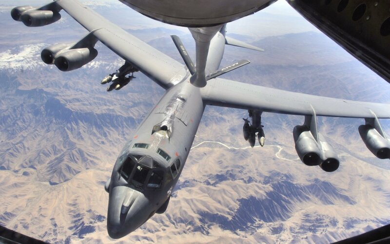 B-52 Bomber Aircraft — Gray, Dramatic, Afternoon, Photograph, Mountains