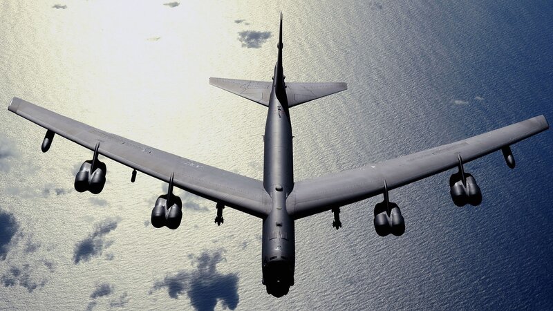 B-52 Bomber Aircraft — Gray, Dramatic, Afternoon, Photograph, Ocean, Clouds, Blue