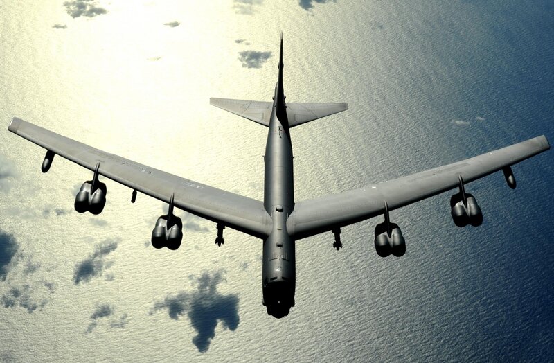 B-52 Bomber Aircraft — Gray, Dramatic, Afternoon, Photograph, Ocean, Clouds