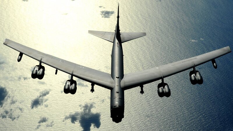 B-52 Bomber Aircraft — Gray, Dramatic, Afternoon, Photograph, Ocean