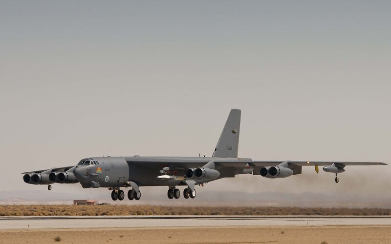 B-52 Bomber Aircraft — Gray, Dramatic, Afternoon, Photograph, Runway