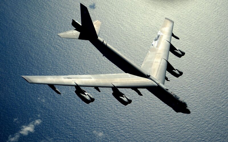 B-52 Bomber Aircraft — Gray, Dramatic, Photograph, Ocean