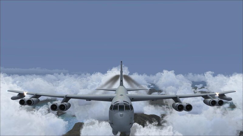 B-52 bomber flying above clouds