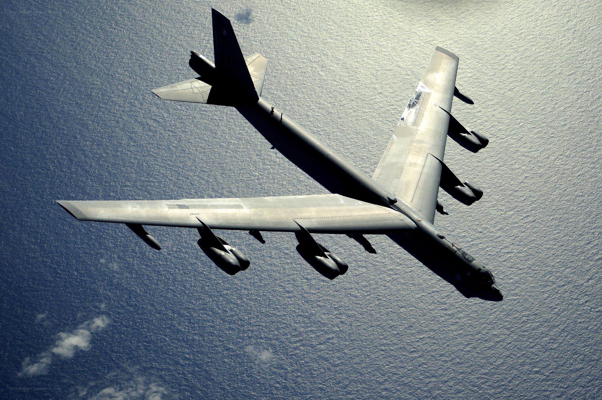 B-52 bomber flying over ocean