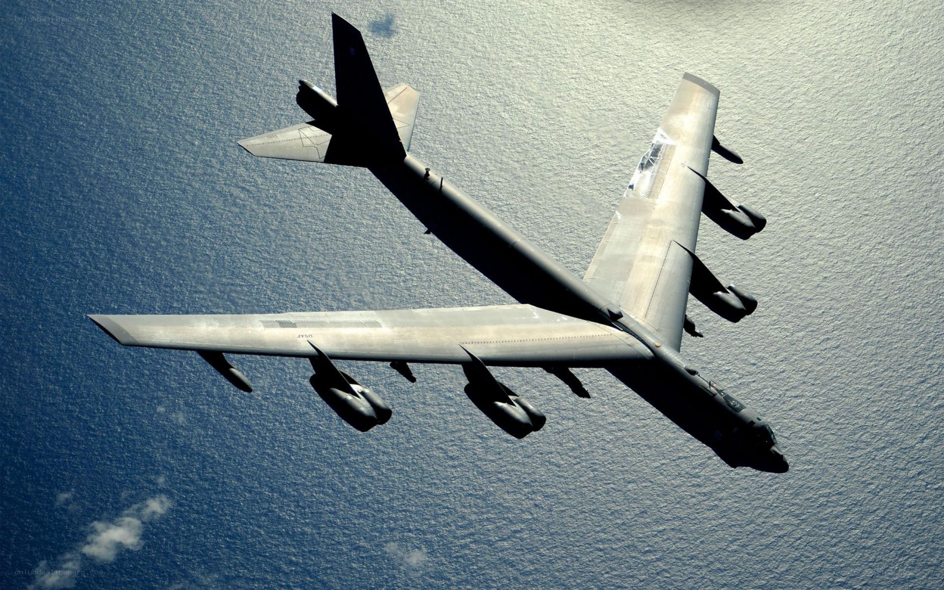 B-52 bomber flying over ocean