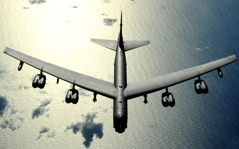 B-52 bomber flying over ocean