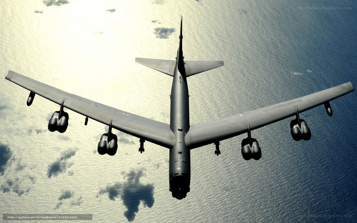 B-52 bomber flying over ocean