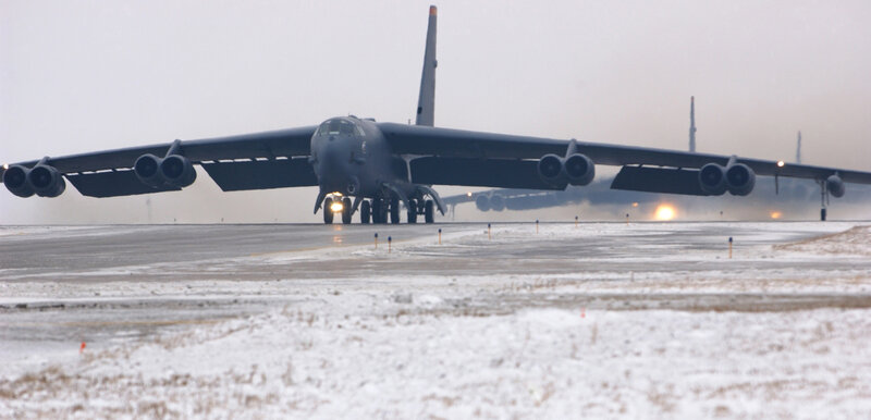 B-52 bomber on snowy runway
