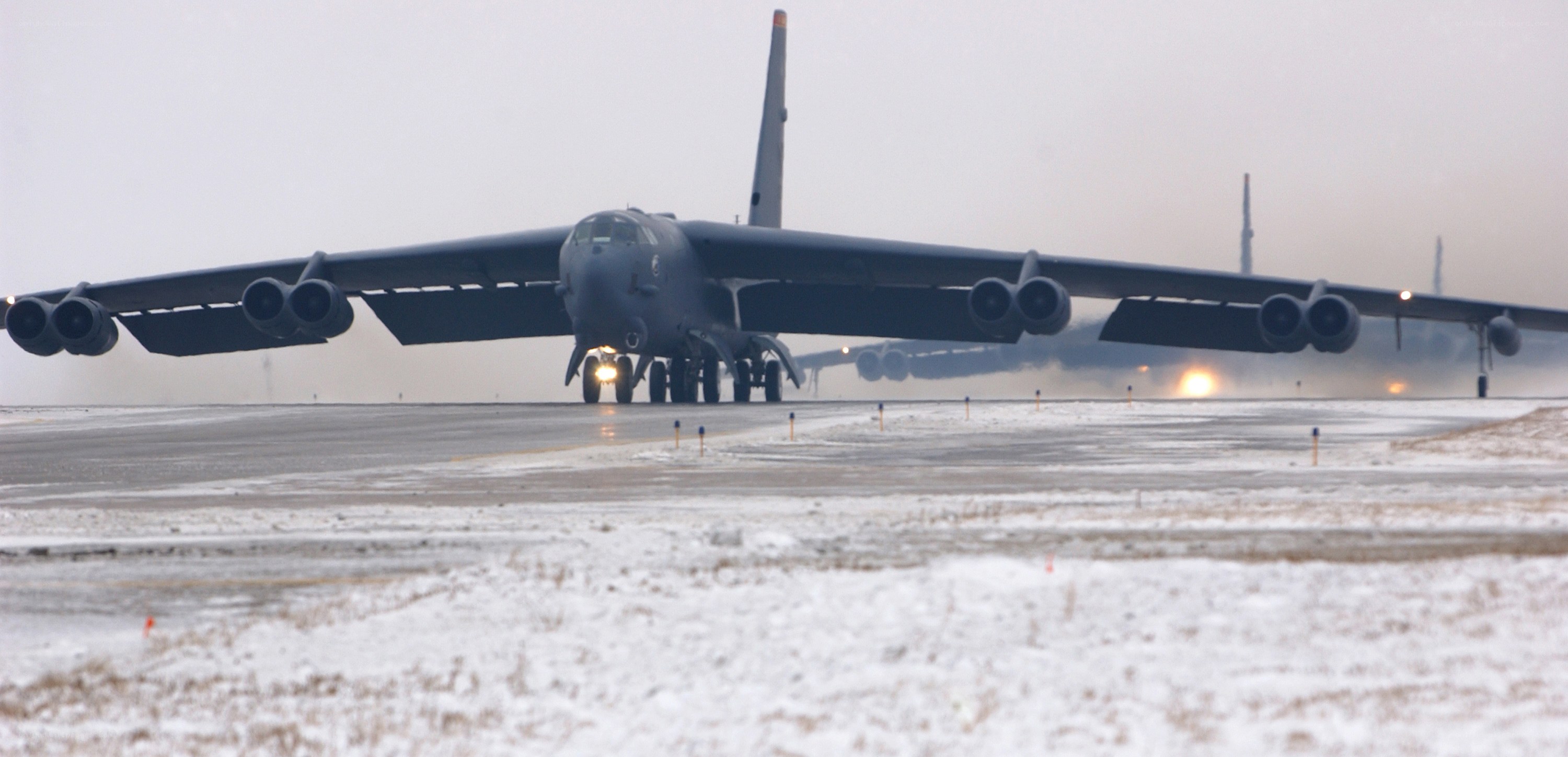 B-52 bomber on snowy runway
