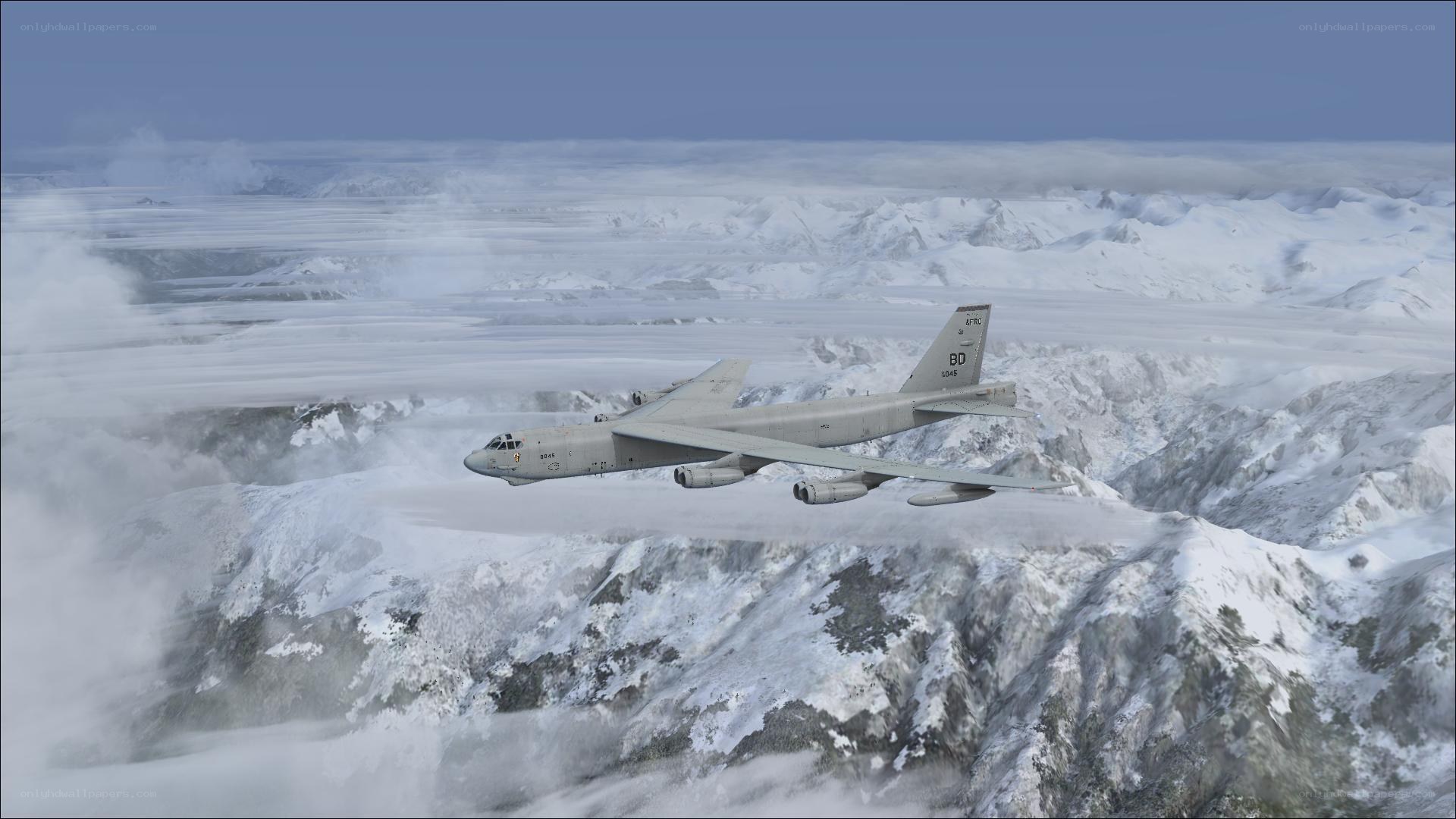 B-52 bomber over snowy mountains