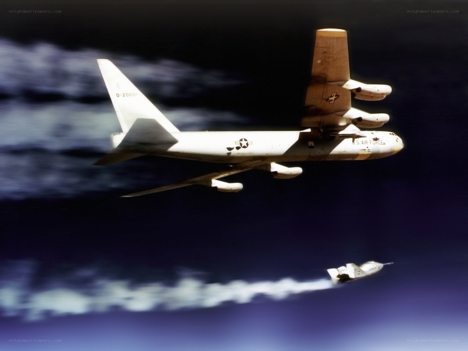 B-52 bomber releasing missile