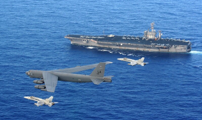 B-52 bomber with fighter escorts