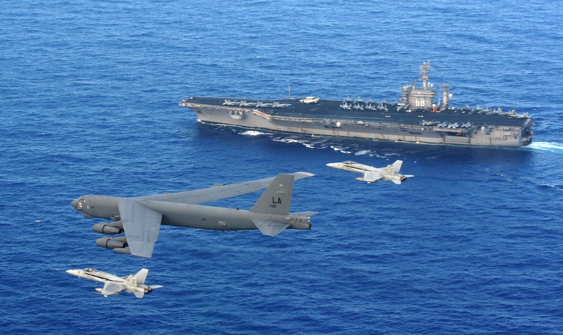 B-52 bomber with fighter escorts