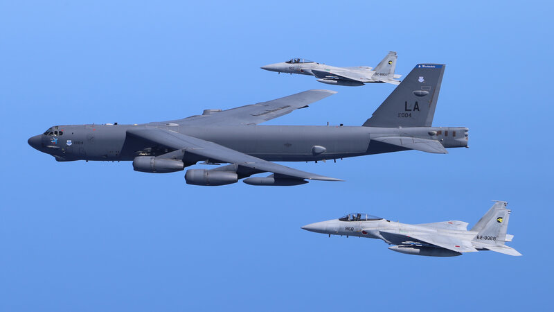 B-52 Bomber with Fighter Jets