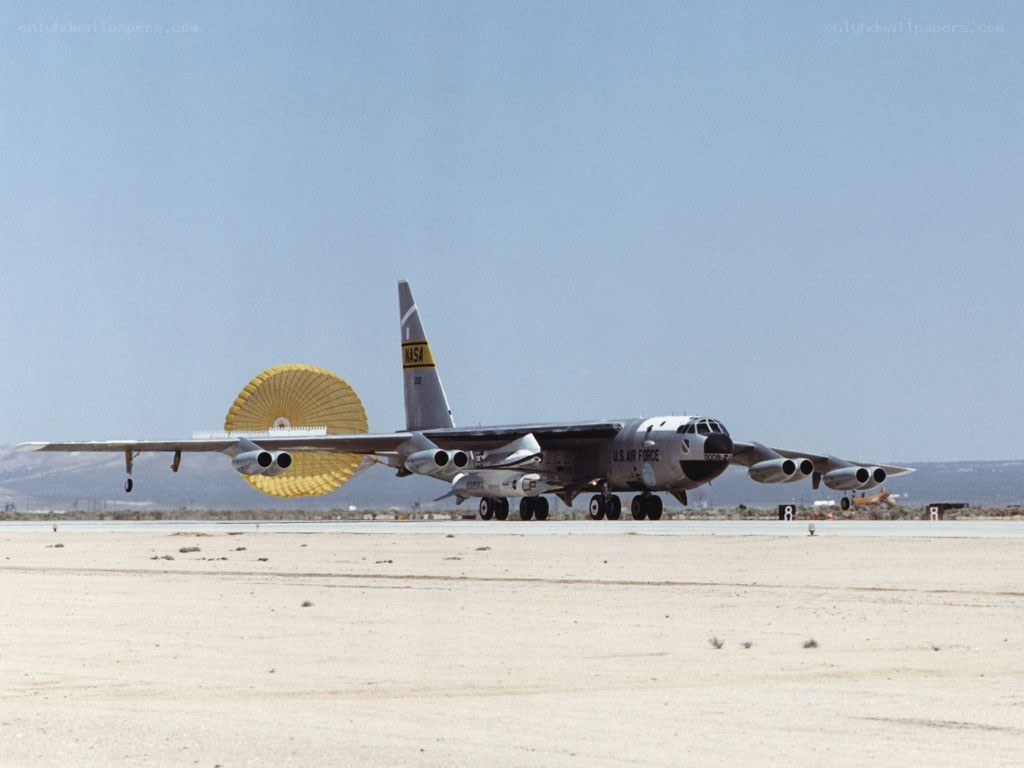 B-52 with parachute on runway