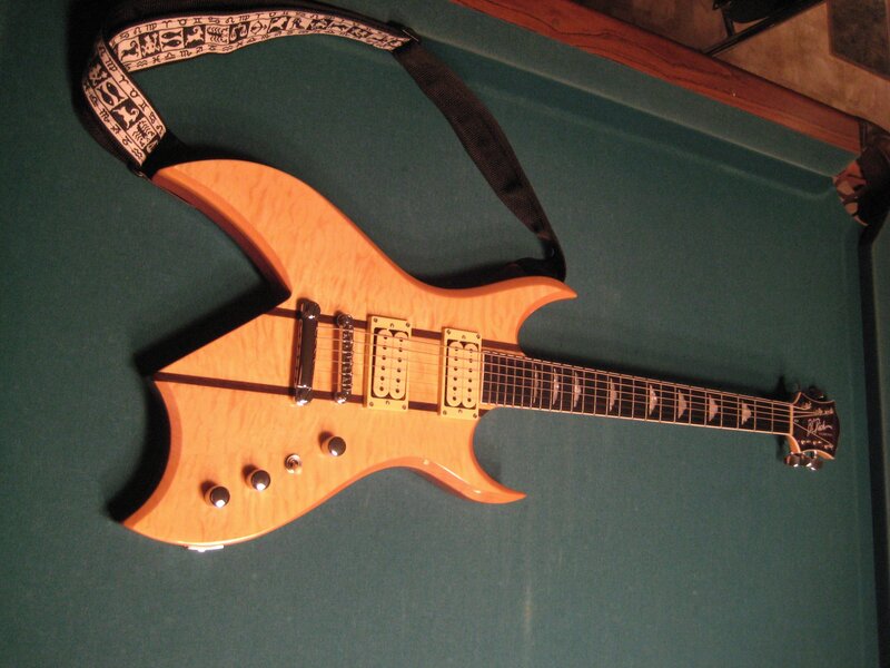 B.C. Rich guitar on pool table