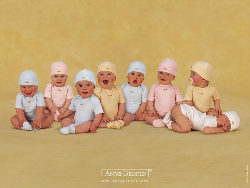 Babies in pastel outfits